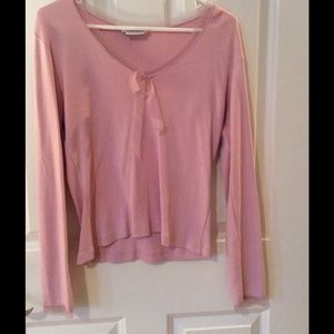 Pink long sleeve blouse.