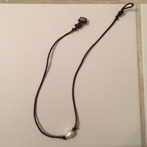 pearl necklace with brown leather chord
