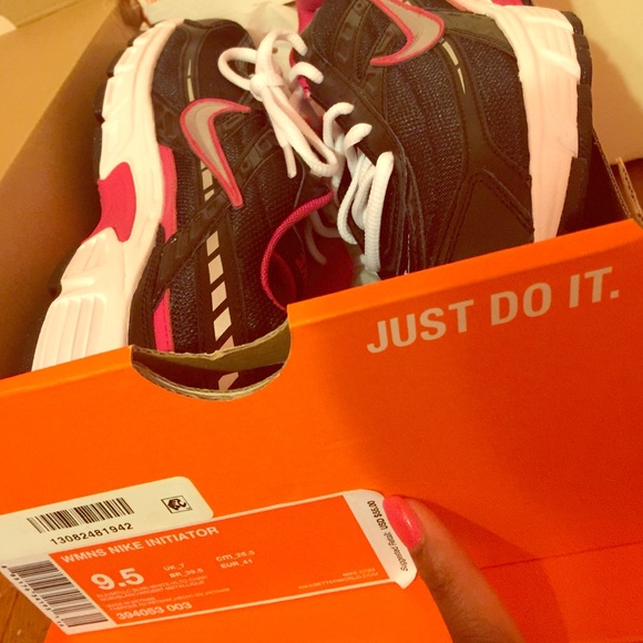 Pink and Black Nike Running Shoes