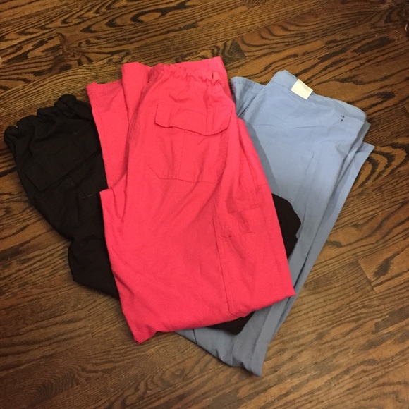 Three pair of scrub pants