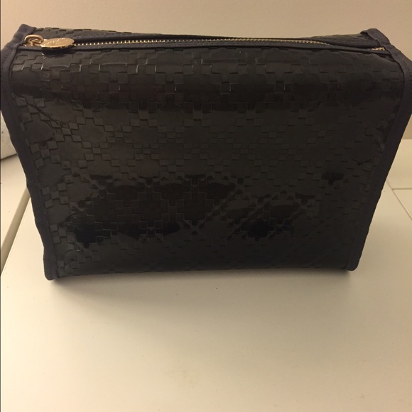 Gucci makeup bag.