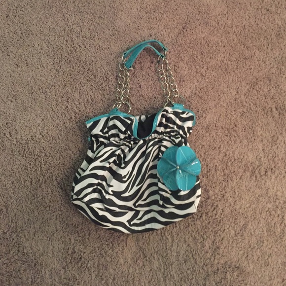 Coral blue and zebra handbag with a floral add on