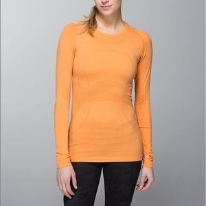 Lululemon run swiftly LS orange. EUC Size 4.