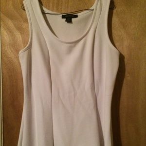 White peplum sleeveless shirt