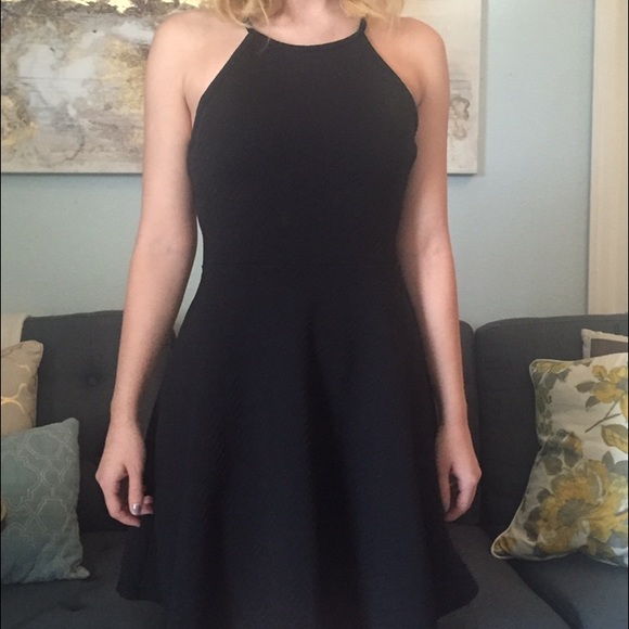 Black dress never worn outside house