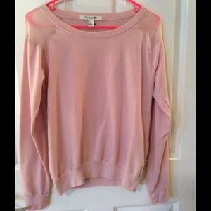 Forever 21 pink crew neck with sheer panels.