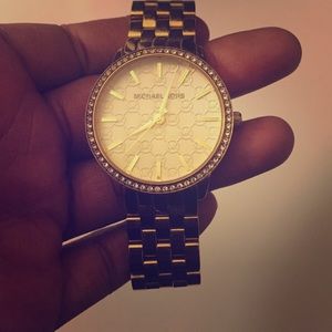 Gold MK watch