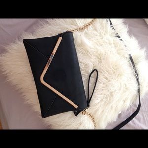 Black and gold cross body