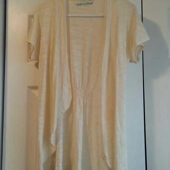 Adorable cream colored short sleeved cardiwrap