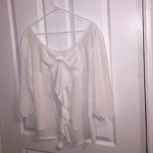 White quarter sleeve blouse with a bow in the back