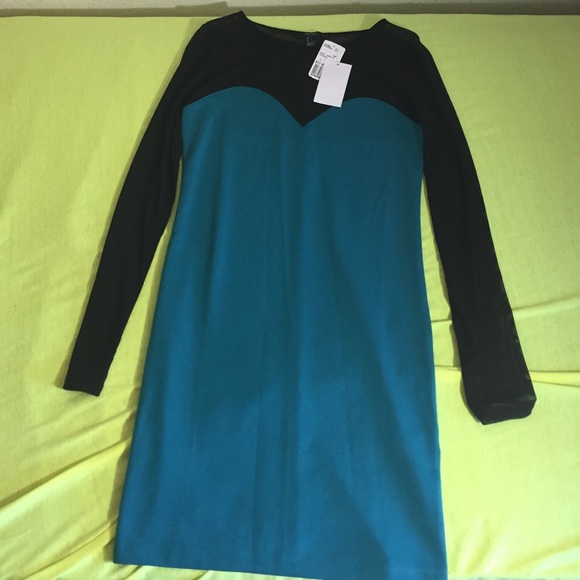 Nice teal, black dress perfect for any occasion