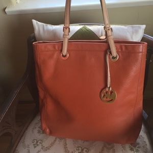 Beautiful Authentic orange Michel Kors bag