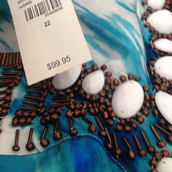 A silky blue dress with rhinestone collar - Picture 4 of 4