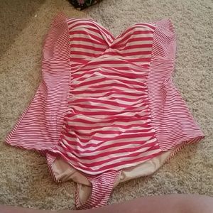 Pink and white striped one piece.