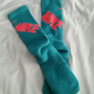 turquoise & neon orange Nike socks