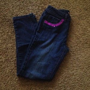 Little girl's bedazzled skinny jeans. 💖💗