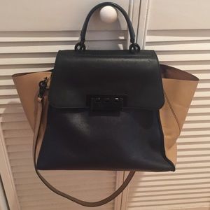 Brand new authentic Eartha Iconic Zac Posen