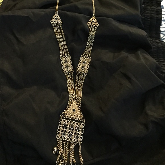 Gold Tone and black stone necklace.