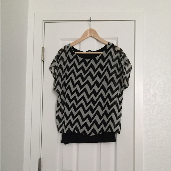 Black and light cream Express top