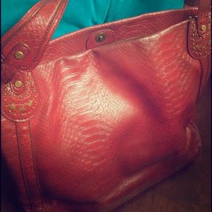 Burgendy red Liz Claiborne leather purse.