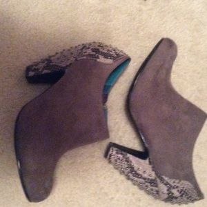 London Rebel booties with animal print and studs.