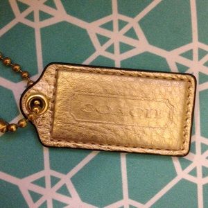 Coach gold hangtag