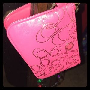 Small Pink Coach Clutch