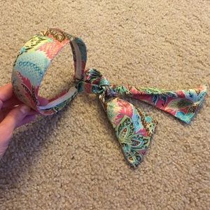 Headband with bow underneath