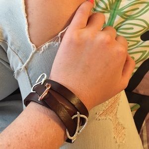 Handmade leather wrap brackets with metal pieces