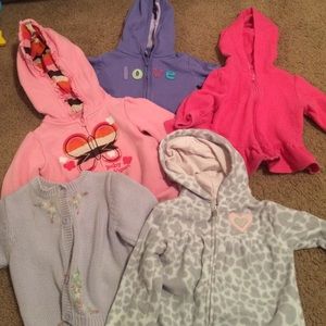 4 zip hoodies and one light purple sweater