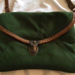 Small forest green material purse