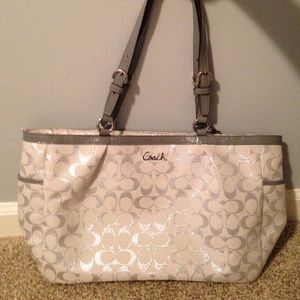 White and silver Coach tote bag