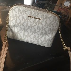 Cream colored Michael Kors logo cross body