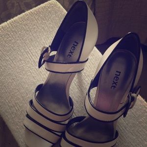 Beige and black heels