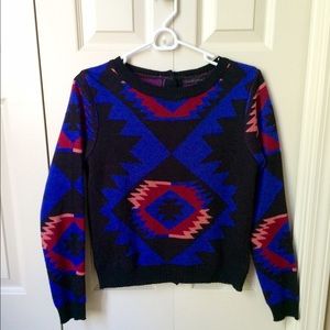Lucca Couture Aztec-inspired button-back sweater.