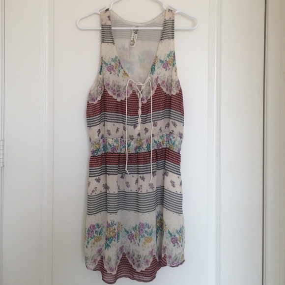 Sleeveless, lace up multi floral print dress.