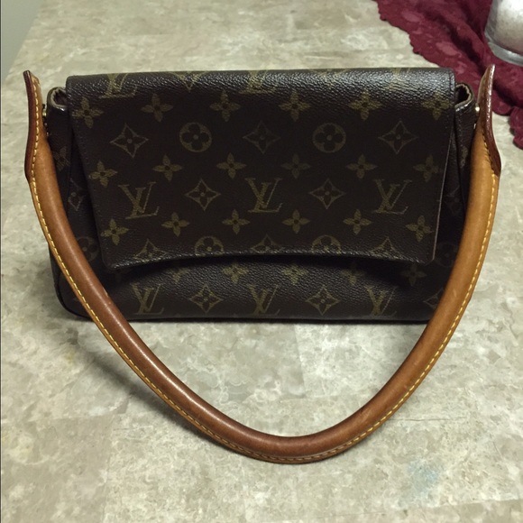 Authentic Louis Vuitton.