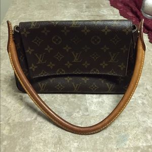 Authentic Louis Vuitton.