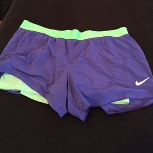 Purple Nike shorts