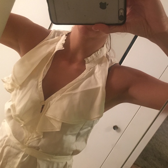 Silky ruffle top cream vneck work top