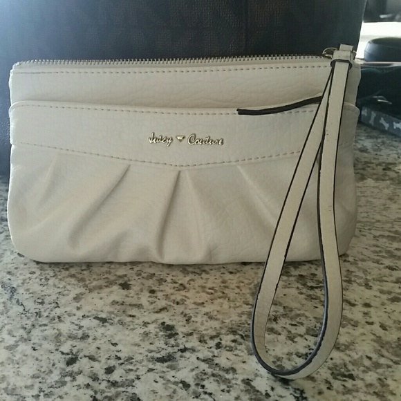 SOLD !!!! Cream Juicy Couture Wristlet