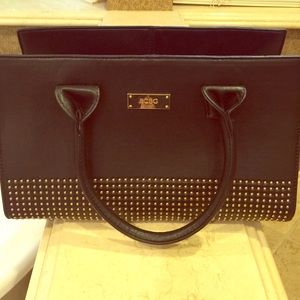 BCBG Black purse with the gold embellishment