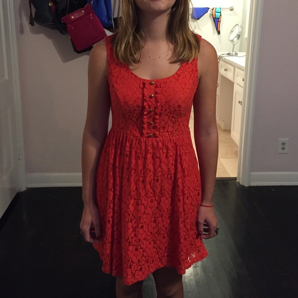 Red lace dress with gold buttons
