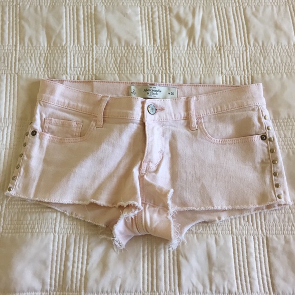 light pink shorts with gold detail
