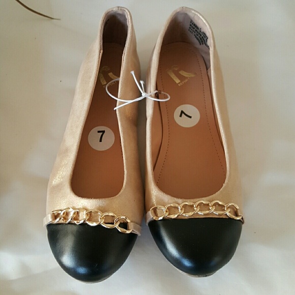 Gold Report Signature Flats