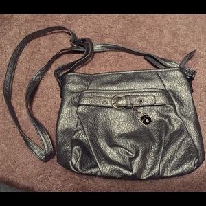 Silver Rosetti cross body. Great condition!