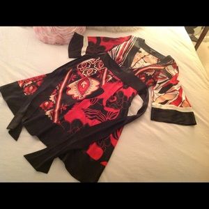 Feel feminine in this Satin Kimono Dress from Bebe