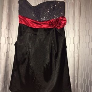 Silver, red, and black strapless party dress