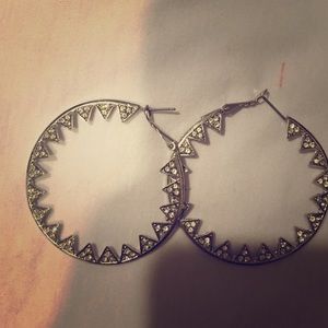 Silver "pie" earrings.