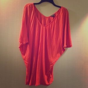 Coral color tunic from Express, size large